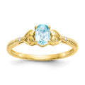 10k 6x4mm Oval December/ Light Swiss Blue Topaz and Diamond Size 7 Ring, 0.56 ct