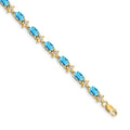 14k Complete Diamond and Oval Swiss Blue Topaz Floral 7 inch Bracelet, 7.112 ct, 7 x 4.5 mm