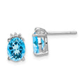Sterling Silver Rhodium Plated Oval Blue Topaz and Diamond Post Earrings, 3.218 ct, 10 x 5 mm